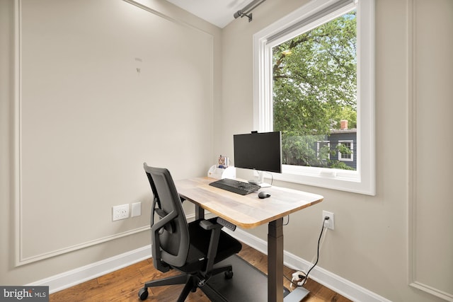 1217 Carrollsburg Pl SW, Washington, DC 20024 - office with baseboards and wood finished floors