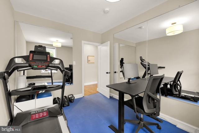 1217 Carrollsburg Pl SW, Washington, DC 20024 - exercise room with baseboards