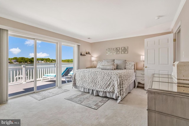 3300 Shore Dr, Annapolis, MD 21403 - bedroom featuring light carpet, access to outside, a water view, and ornamental molding