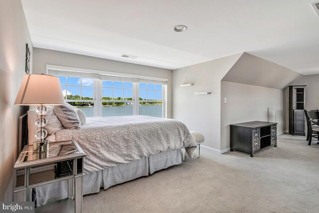 3300 Shore Dr, Annapolis, MD 21403 - bedroom with multiple windows, a water view, baseboards, carpet flooring, and lofted ceiling