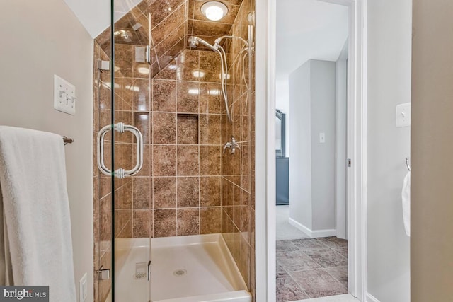 3300 Shore Dr, Annapolis, MD 21403 - bathroom featuring a stall shower and baseboards