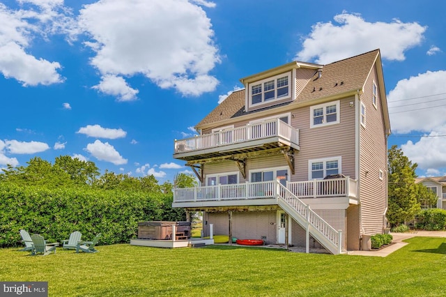 3300 Shore Dr, Annapolis, MD 21403 - back of property featuring a hot tub, a deck, a yard, and stairs