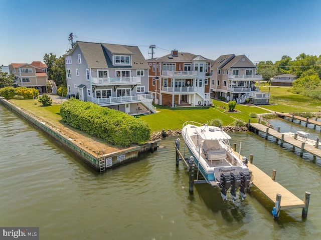 3300 Shore Dr, Annapolis, MD 21403 - dock area with boat lift, a water view, and a yard