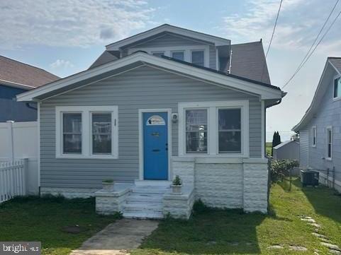 8321 Bayside Rd, Chesapeake Beach, MD 20732 - bungalow-style house featuring central AC