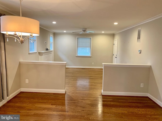3528 14th St N, Arlington, VA 22201 - spare room with crown molding, recessed lighting, a chandelier, wood finished floors, and baseboards