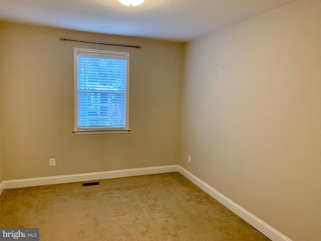 3528 14th St N, Arlington, VA 22201 - spare room featuring light carpet and baseboards