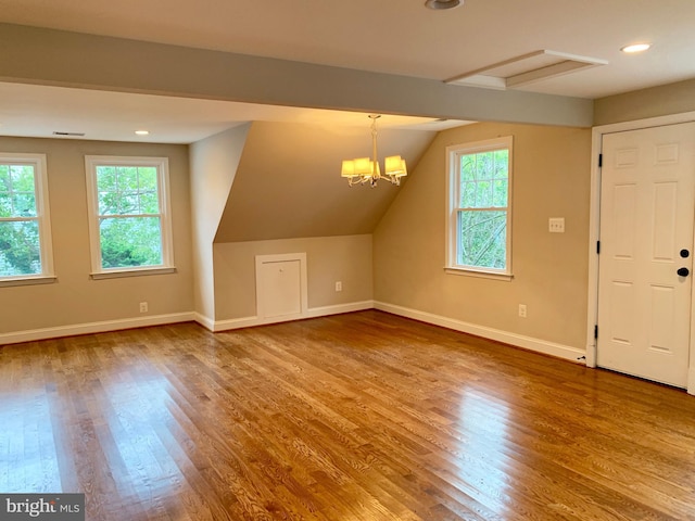 3528 14th St N, Arlington, VA 22201 - additional living space with baseboards, wood finished floors, vaulted ceiling, a chandelier, and recessed lighting