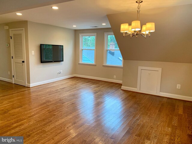 3528 14th St N, Arlington, VA 22201 - additional living space with a chandelier, wood finished floors, baseboards, and recessed lighting