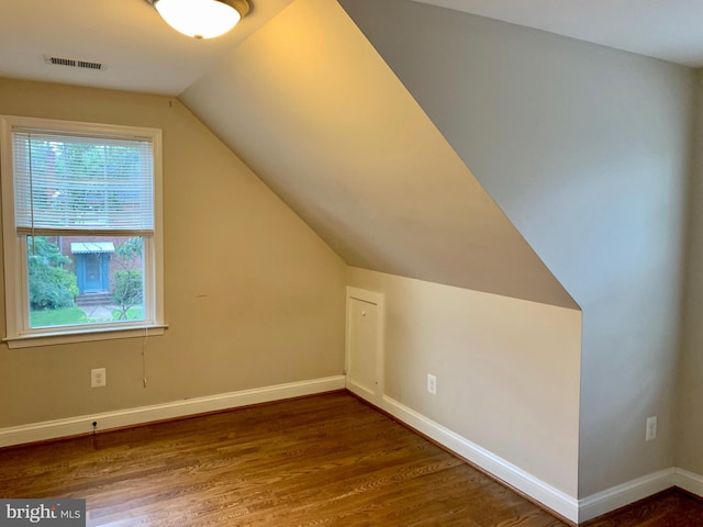 3528 14th St N, Arlington, VA 22201 - additional living space featuring wood finished floors, baseboards, and lofted ceiling