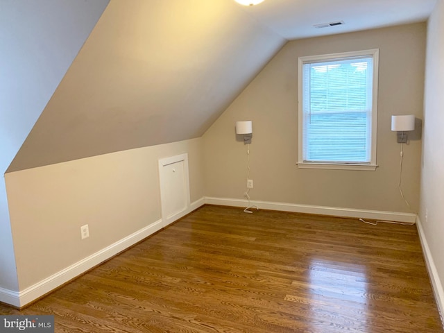 3528 14th St N, Arlington, VA 22201 - bonus room with baseboards, lofted ceiling, and wood finished floors