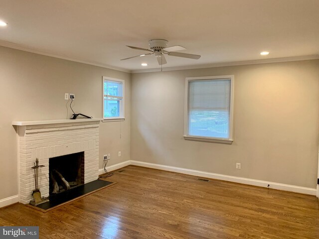 3528 14th St N, Arlington, VA 22201 - unfurnished living room featuring ceiling fan, a fireplace, crown molding, wood finished floors, and recessed lighting