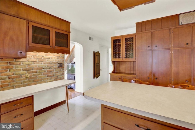 217 E Chestnut St, Cleona, PA 17042 - kitchen featuring light floors, light countertops, and brown cabinetry