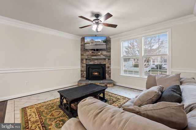 1257 N Fairfax Blvd, Ranson, WV 25438 - living room with ornamental molding, a ceiling fan, baseboards, and a stone fireplace