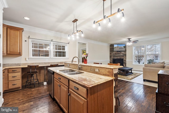 1257 N Fairfax Blvd, Ranson, WV 25438 - kitchen with a sink, a fireplace, stainless steel dishwasher, a ceiling fan, and open floor plan
