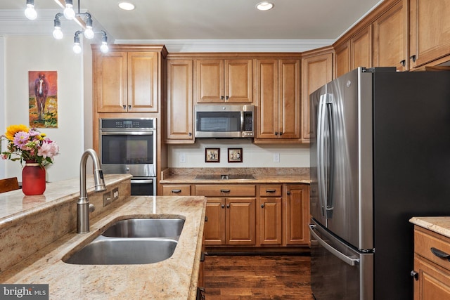 1257 N Fairfax Blvd, Ranson, WV 25438 - kitchen with stainless steel appliances, a sink, brown cabinetry, light stone countertops, and dark wood-style floors