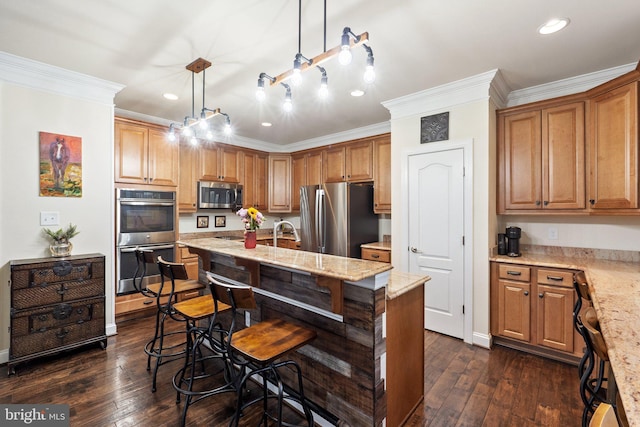 1257 N Fairfax Blvd, Ranson, WV 25438 - kitchen with stainless steel appliances, crown molding, dark wood-style floors, a kitchen bar, and light stone countertops
