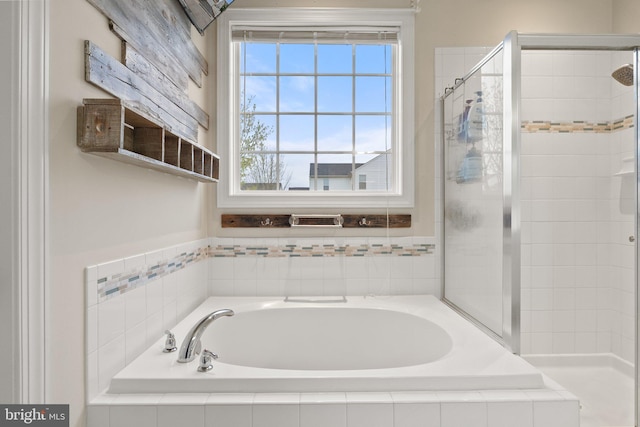 1257 N Fairfax Blvd, Ranson, WV 25438 - full bath featuring a garden tub, a shower stall, and healthy amount of natural light