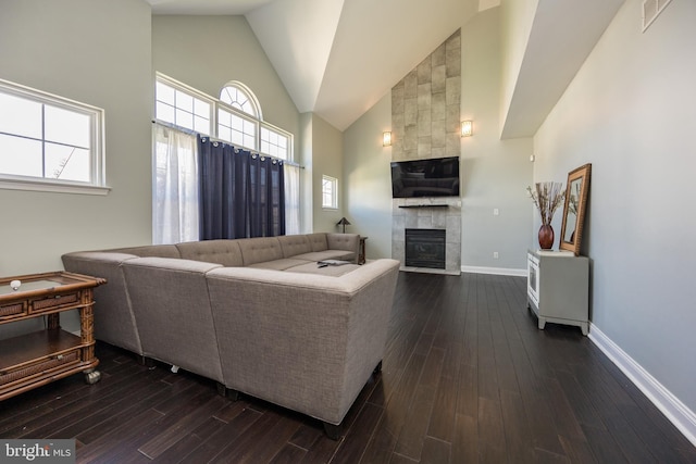 8 Bordeaux Blvd, Newark, DE 19702 - living room with high vaulted ceiling, dark wood-type flooring, and a fireplace