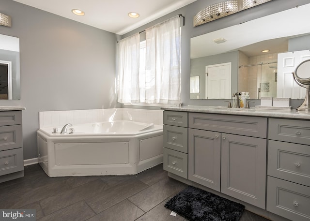 8 Bordeaux Blvd, Newark, DE 19702 - bathroom featuring vanity, a shower stall, a bath, and recessed lighting