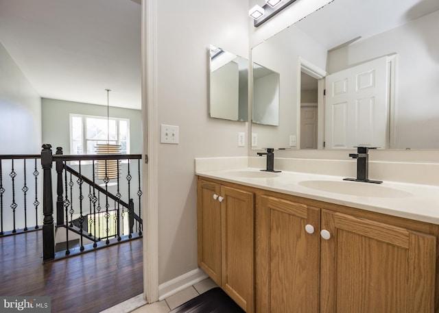 8 Bordeaux Blvd, Newark, DE 19702 - bathroom featuring double vanity and wood finished floors