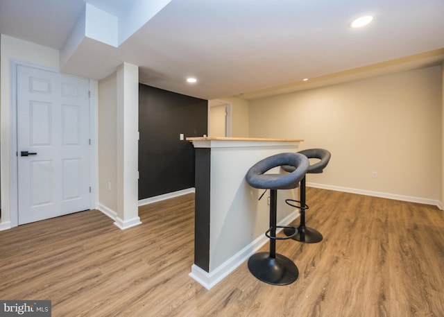 8 Bordeaux Blvd, Newark, DE 19702 - indoor dry bar featuring light wood-style flooring and recessed lighting