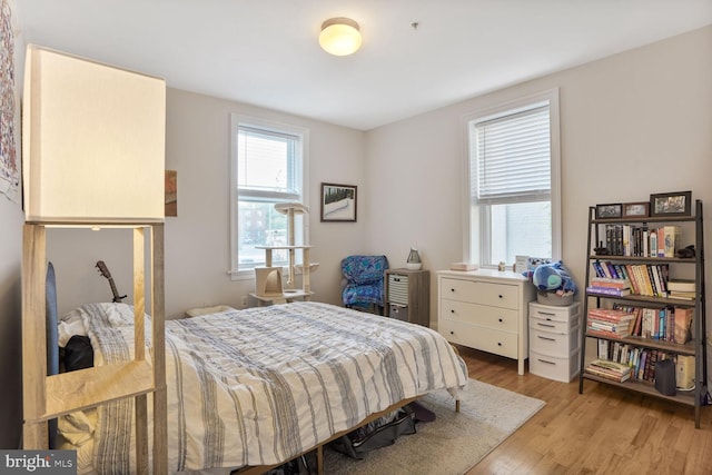 1443 Oak St NW Unit 102, Washington, DC 20010 - bedroom with light wood-style floors