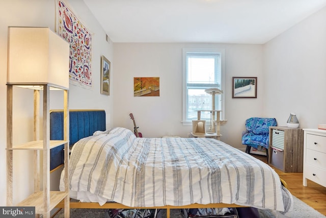 1443 Oak St NW Unit 102, Washington, DC 20010 - bedroom with wood finished floors