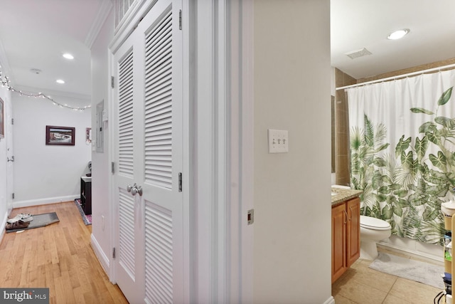 1443 Oak St NW Unit 102, Washington, DC 20010 - hallway with recessed lighting and baseboards