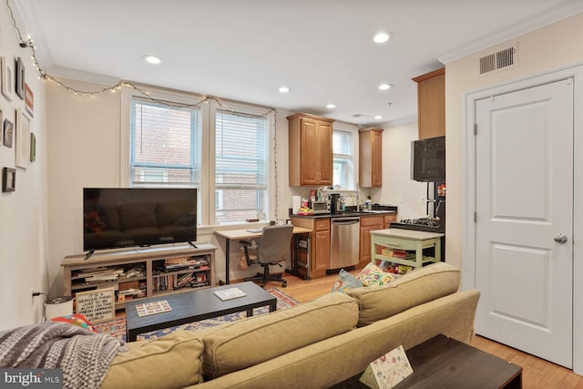 1443 Oak St NW Unit 102, Washington, DC 20010 - living room with light wood-style flooring, recessed lighting, and ornamental molding