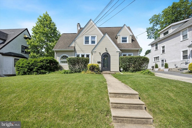722 Mason Ave, Drexel Hill, PA 19026 - view of front of property with a chimney, a front lawn, and roof with shingles