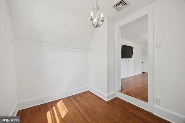 722 Mason Ave, Drexel Hill, PA 19026 - unfurnished dining area featuring wood finished floors, baseboards, a chandelier, and vaulted ceiling