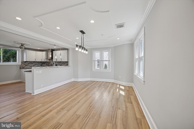 722 Mason Ave, Drexel Hill, PA 19026 - unfurnished living room featuring crown molding, light wood-style floors, recessed lighting, a ceiling fan, and baseboards