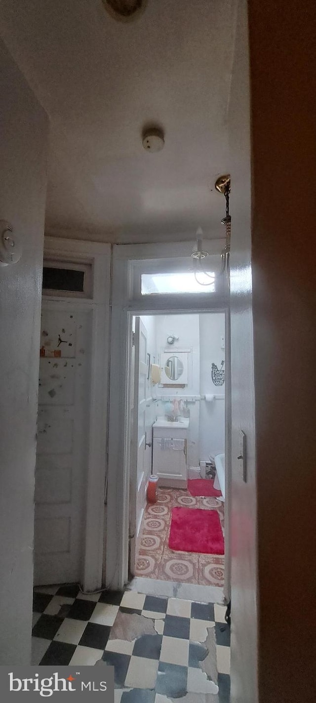 2207 W Lafayette Ave, Baltimore, MD 21216 - corridor featuring tile patterned floors