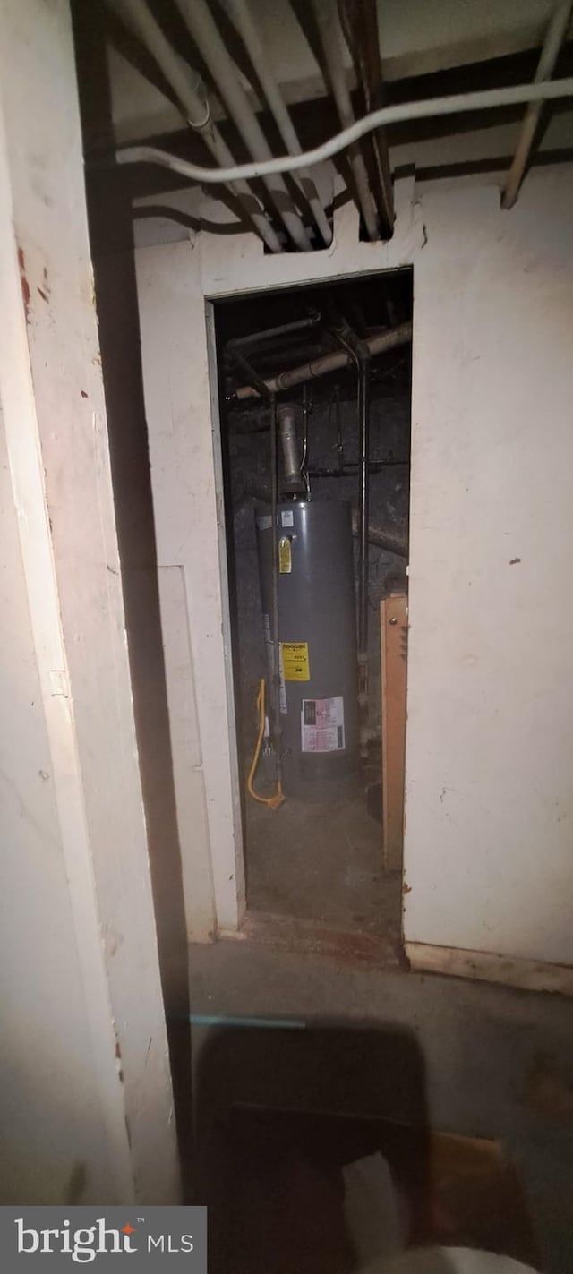 2207 W Lafayette Ave, Baltimore, MD 21216 - utility room featuring water heater