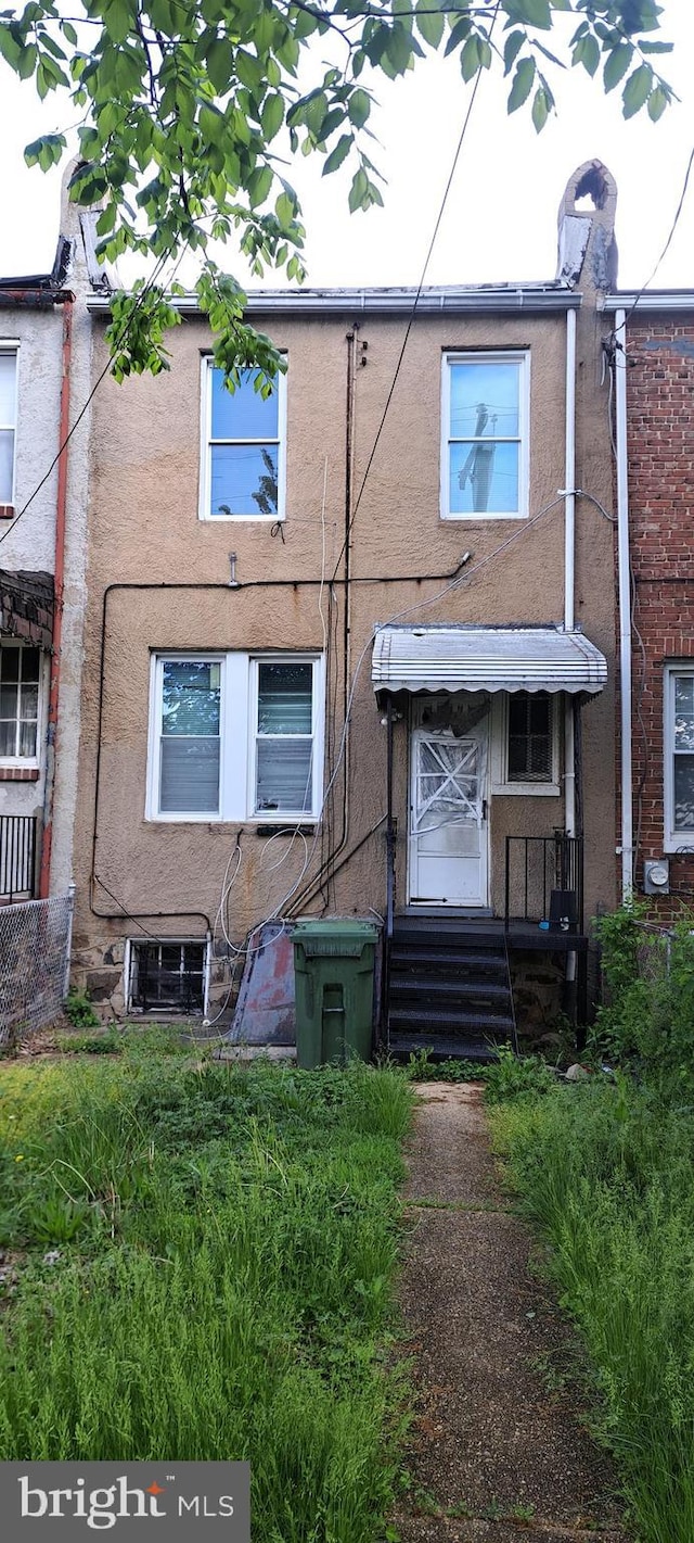 2207 W Lafayette Ave, Baltimore, MD 21216 - view of front of home with stucco siding
