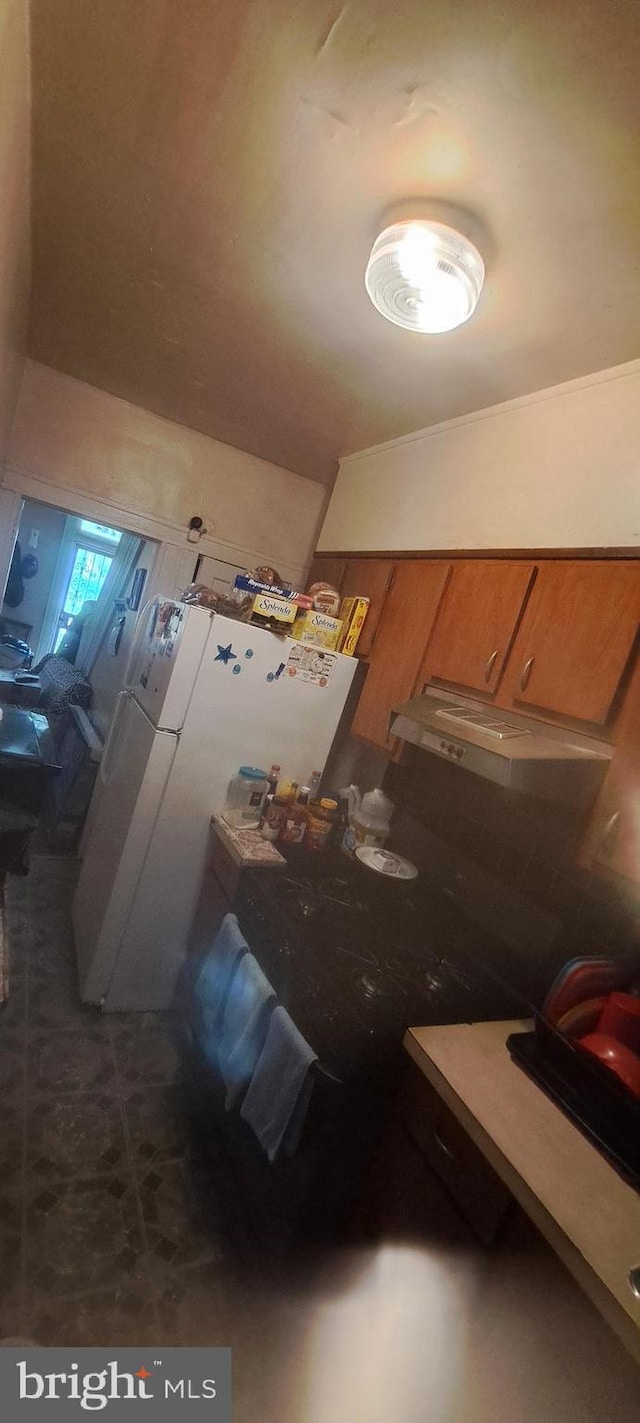 2207 W Lafayette Ave, Baltimore, MD 21216 - kitchen with brown cabinets