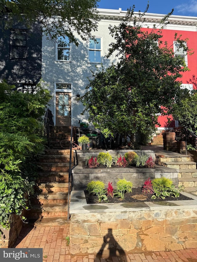422 11th St SE, Washington, DC 20003 - view of front facade with stairway and stucco siding