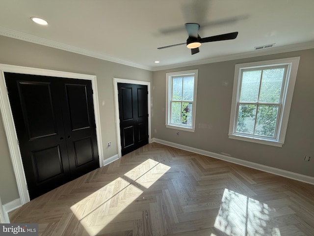 422 11th St SE, Washington, DC 20003 - unfurnished bedroom with baseboards, multiple closets, recessed lighting, ornamental molding, and ceiling fan