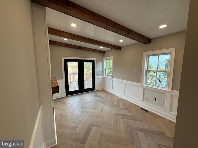 422 11th St SE, Washington, DC 20003 - spare room with french doors, beamed ceiling, a wainscoted wall, recessed lighting, and a decorative wall
