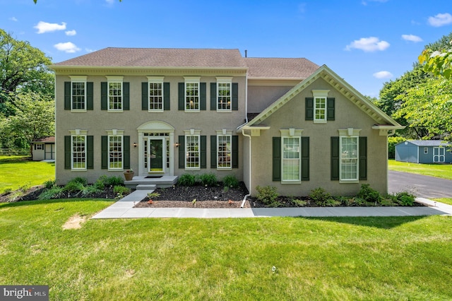 859 Empress Rd, West Chester, PA 19382 - view of front of home with stucco siding and a front lawn