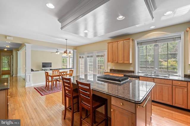 859 Empress Rd, West Chester, PA 19382 - kitchen featuring a ceiling fan, a sink, dishwashing machine, open floor plan, and a center island