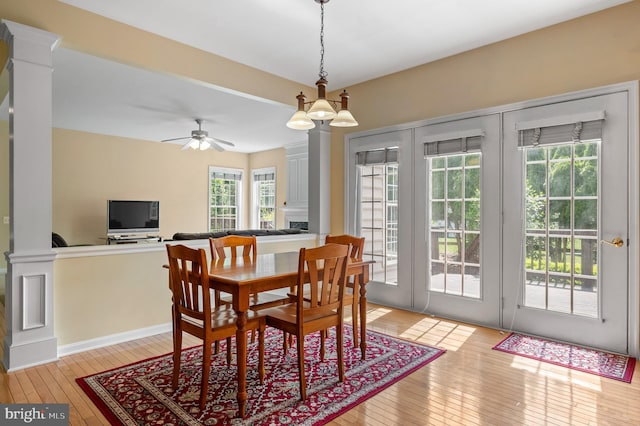 859 Empress Rd, West Chester, PA 19382 - dining area featuring decorative columns, light wood finished floors, and ceiling fan