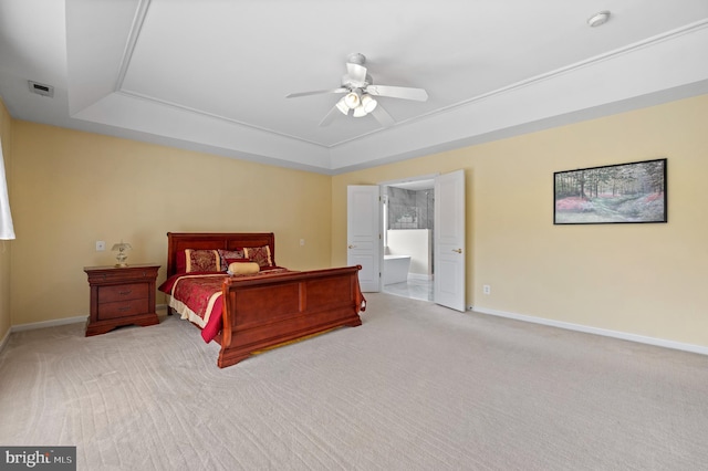 859 Empress Rd, West Chester, PA 19382 - bedroom featuring a raised ceiling, light colored carpet, baseboards, and connected bathroom
