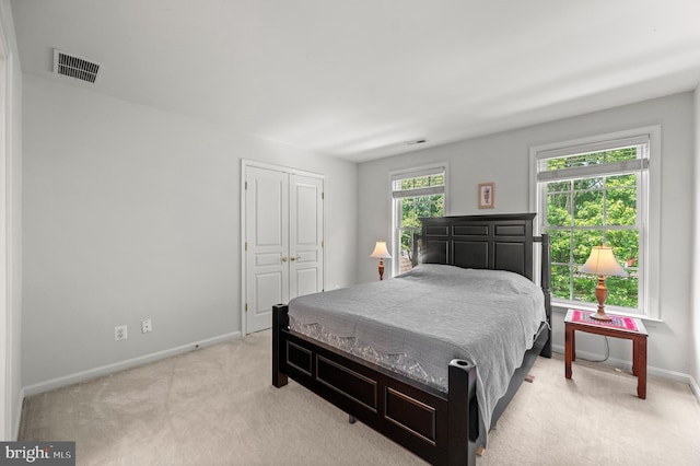 859 Empress Rd, West Chester, PA 19382 - bedroom featuring light carpet, baseboards, and a closet