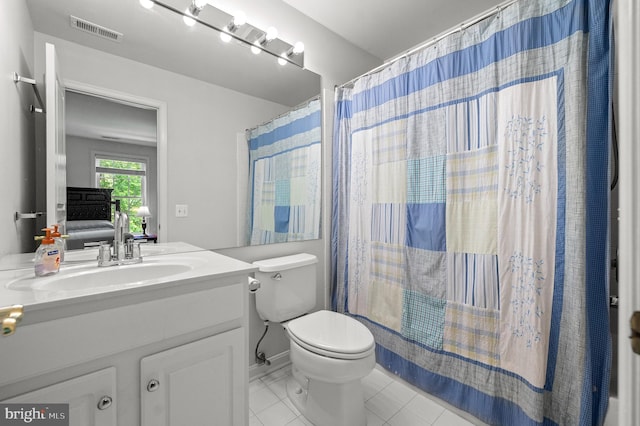 859 Empress Rd, West Chester, PA 19382 - full bath with vanity, tile patterned floors, toilet, and a shower with curtain