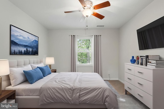 1403 E Abingdon Dr E Unit 3, Alexandria, VA 22314 - bedroom featuring light colored carpet, baseboards, and ceiling fan