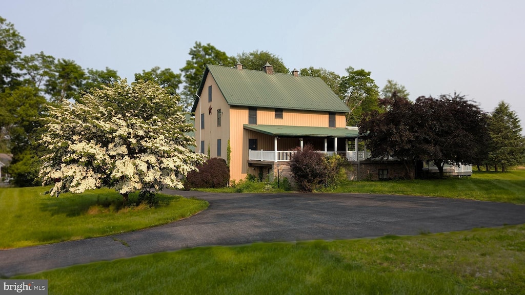 161 Central View Rd, Dillsburg, PA 17019 - country-style home featuring a chimney, driveway, metal roof, and a front lawn