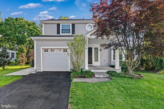 10462 Brackets Ford Cir, Manassas, VA 20110 - traditional home with a front yard, an attached garage, asphalt driveway, and covered porch