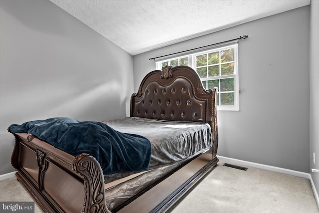10462 Brackets Ford Cir, Manassas, VA 20110 - bedroom with a textured ceiling, baseboards, and carpet