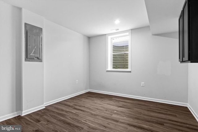10462 Brackets Ford Cir, Manassas, VA 20110 - below grade area featuring electric panel, dark wood-type flooring, and baseboards